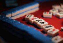 a set of mahjong tiles on a game board