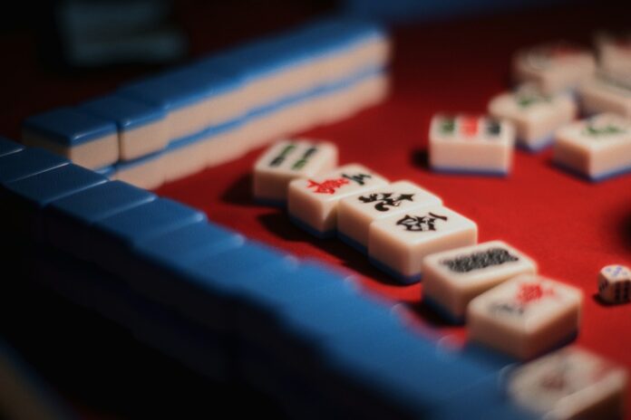 a set of mahjong tiles on a game board