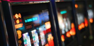 a row of slot machines inside a casino