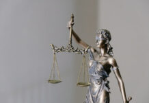 Lady Justice statue holding scales